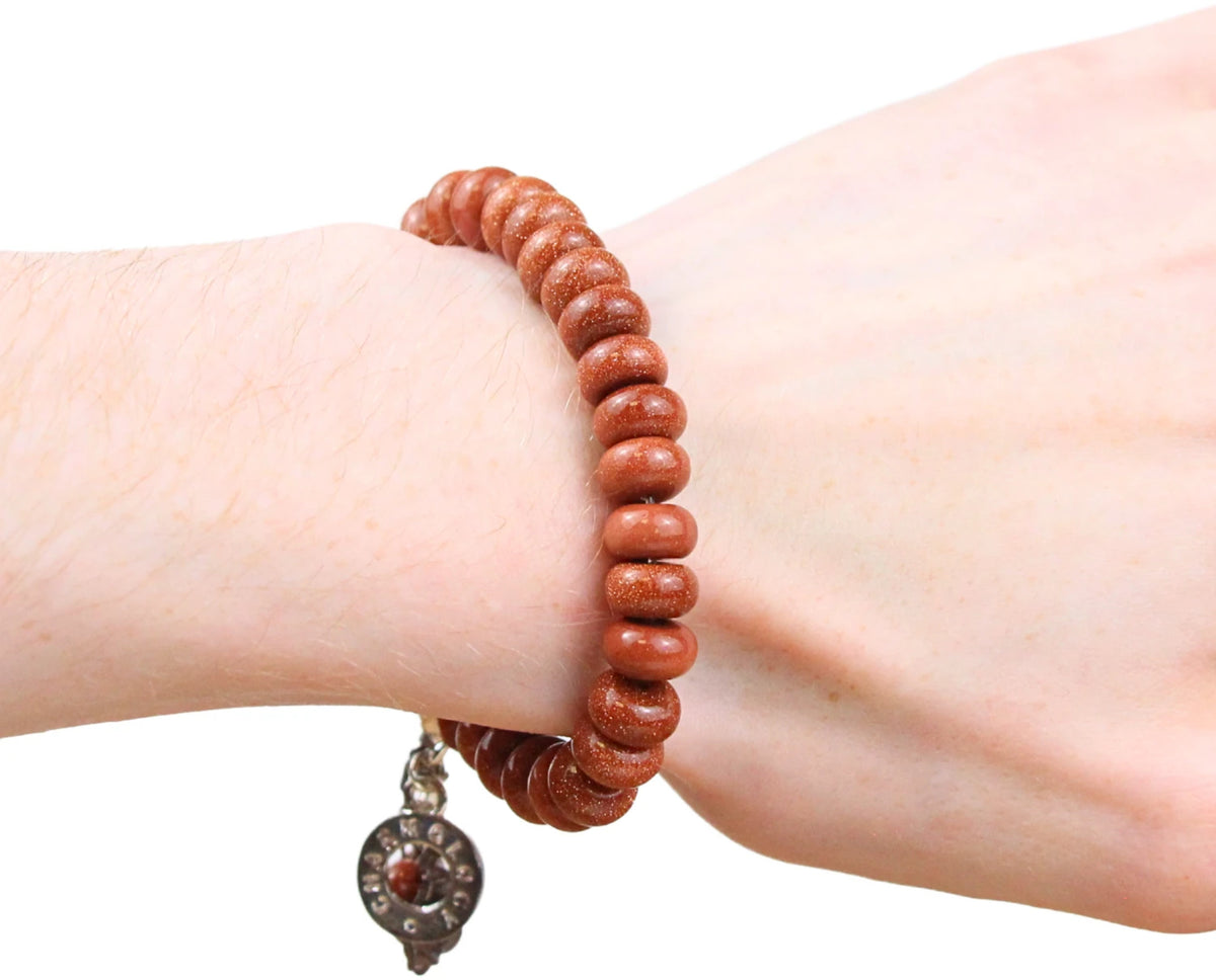 Guldsten armband med berlocker (glas), 18 cm