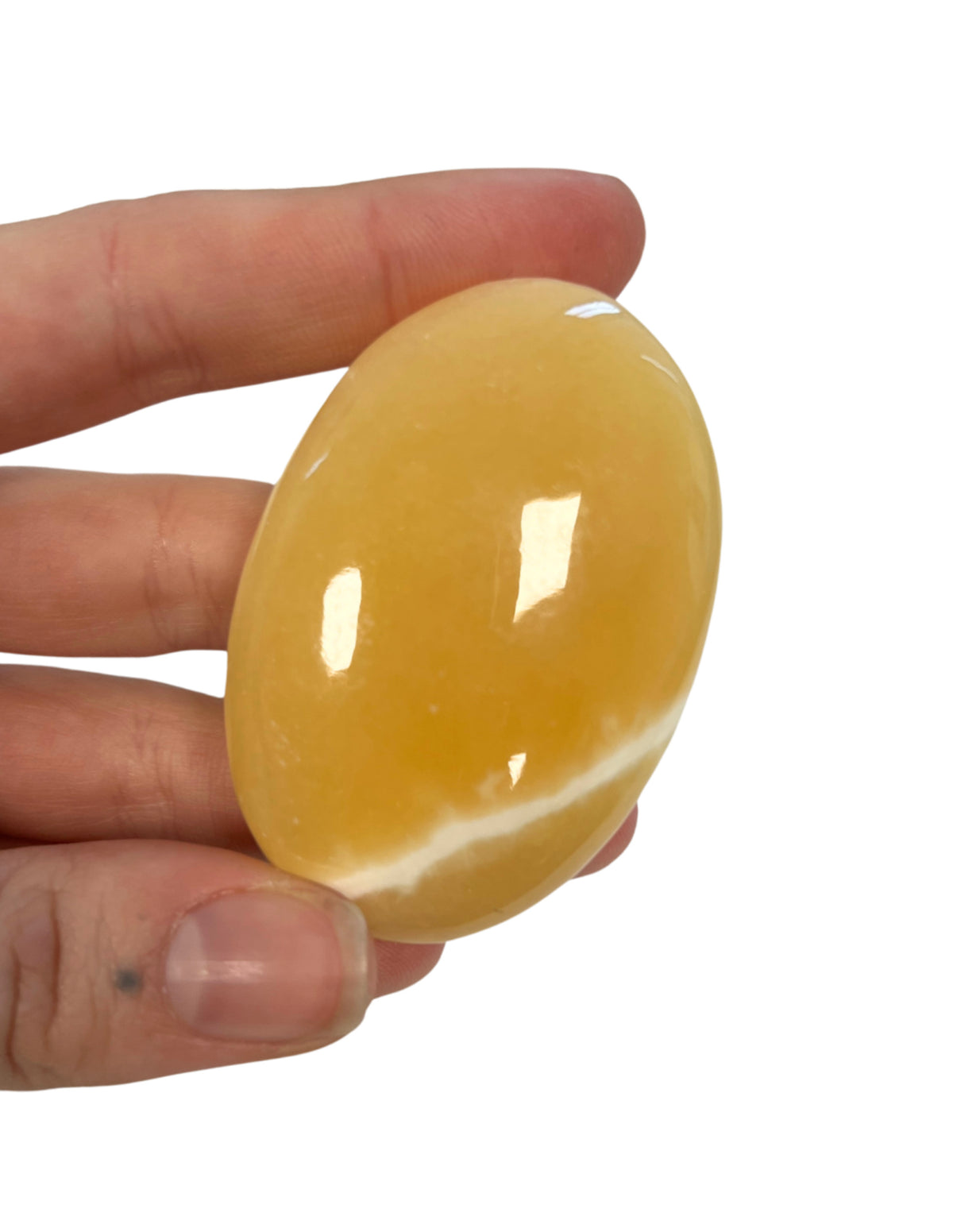 Mangokalcit handsten, gul, 4 till 6 cm, ca 90 g