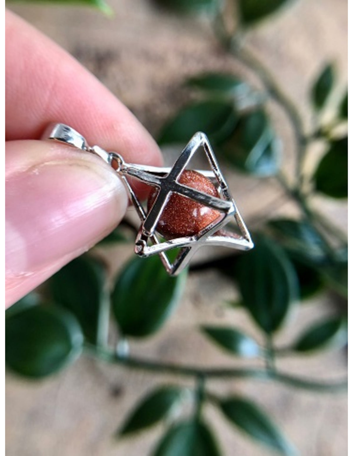 Guldsten hänge i merkabah-bur (glas)